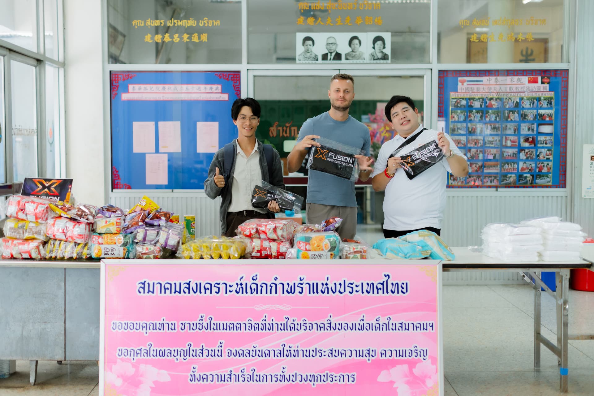 Zeljko Cikojevic and XFusion partners with donated supplies at a school in Thailand